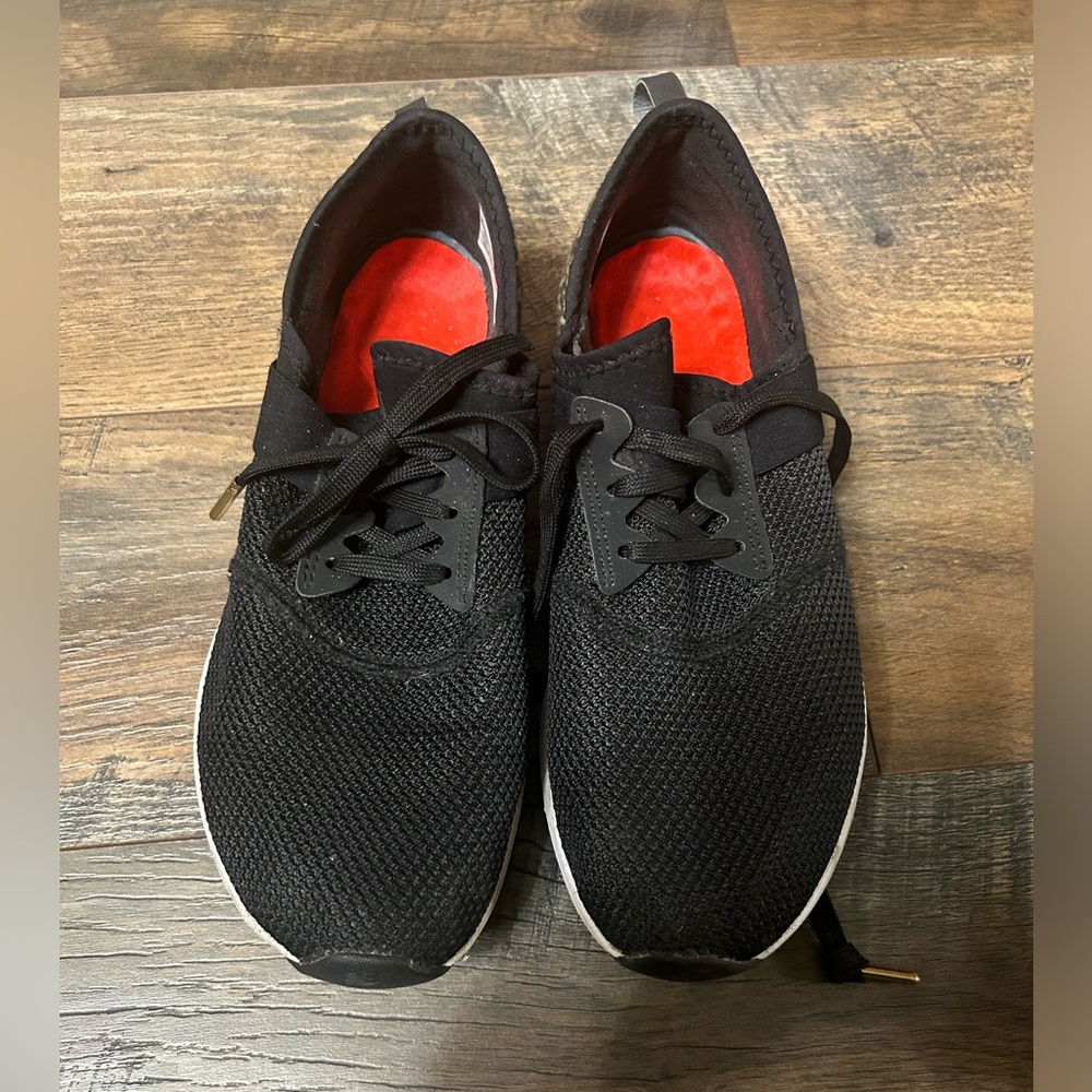 Black and cheetah New Balance tennis shoes